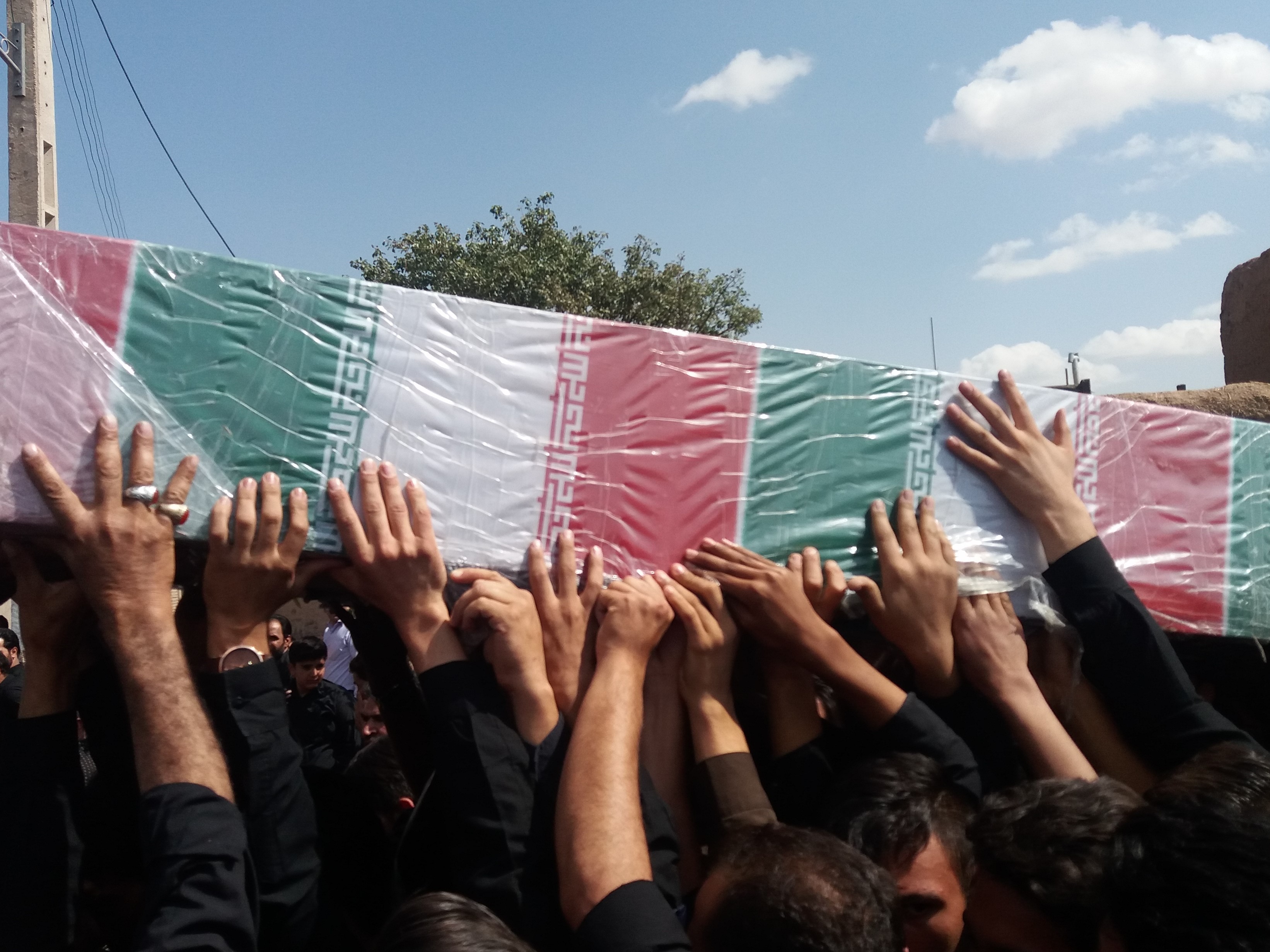 مراسم وداع با شکوه مردم رخ با پیکر مطهر شهید گمنام